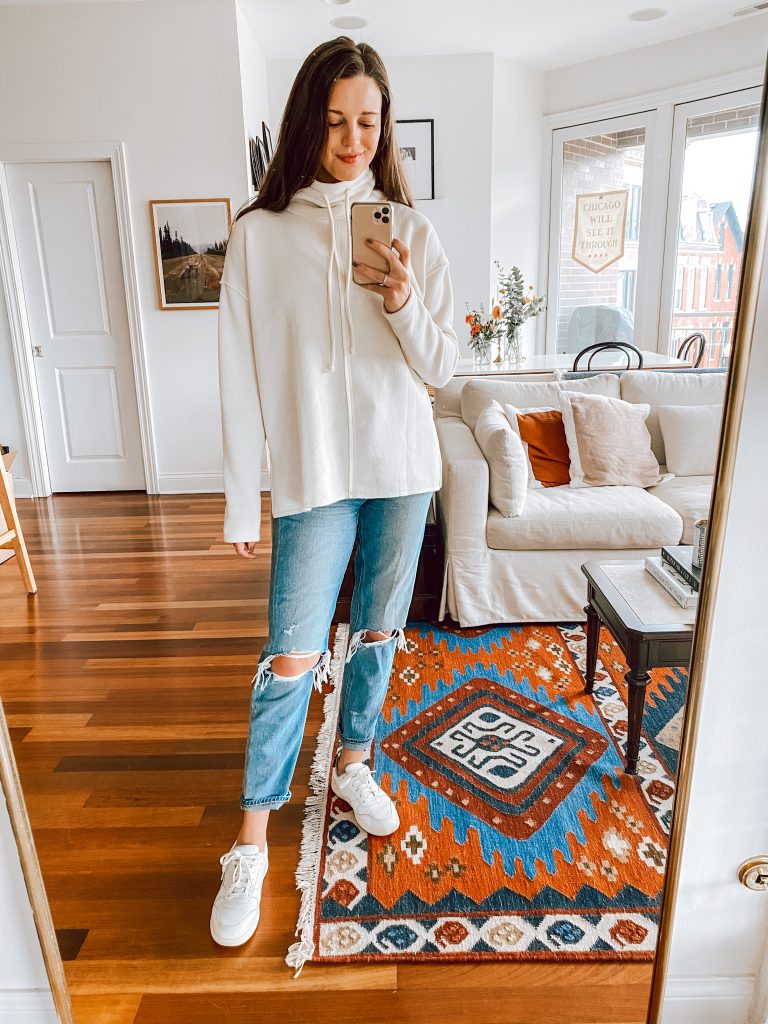 White Sweatshirt & Ripped Denim Jeans White Sweatshirt & Ripped Denim Jeans