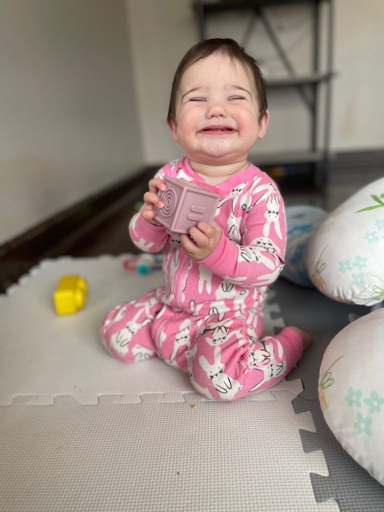 Baby holding a block Baby holding a block
