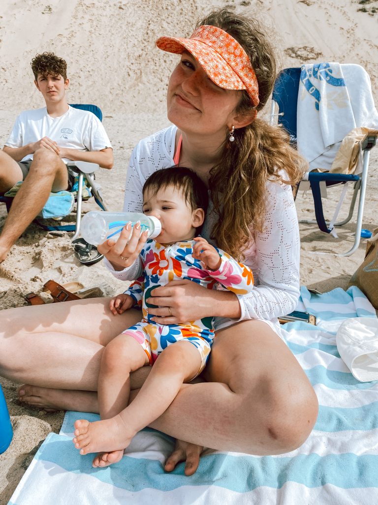 Cousins feeding baby milk Cousins feeding baby milk