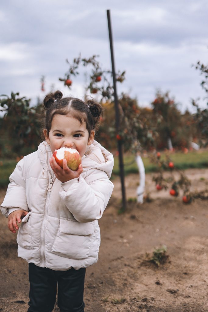 June biting on an apple June biting on an apple